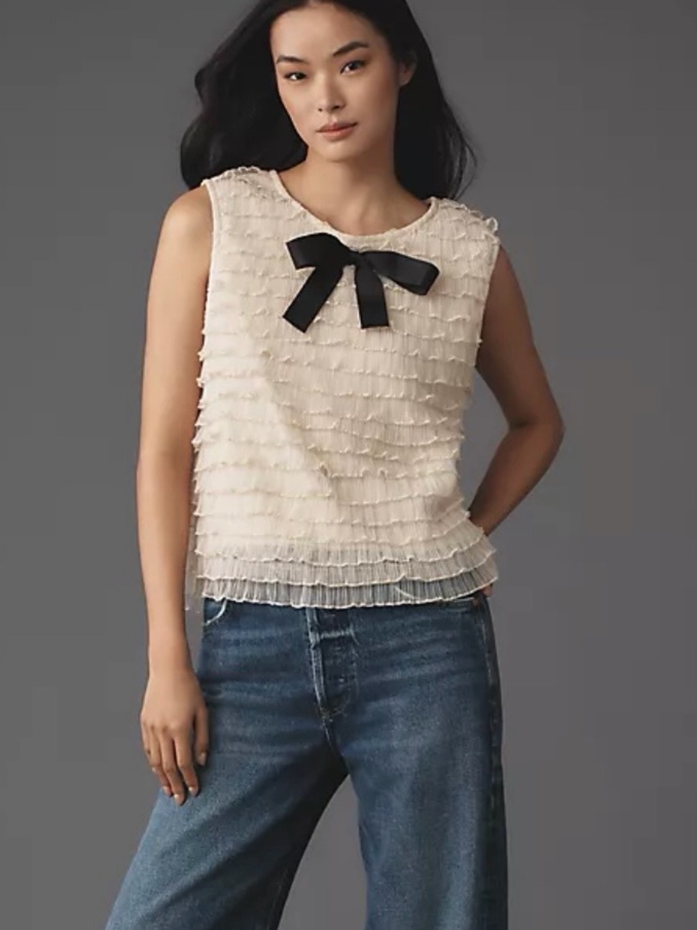 Anthropologie Cream Ruffle Sleeveless Tank with Black Bow Accent